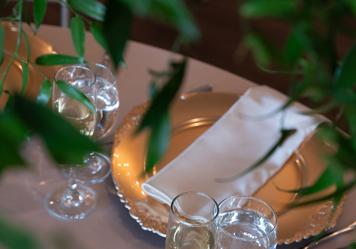 place setting with wine and water glasses